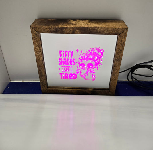 50 Shades of Tired Light Box