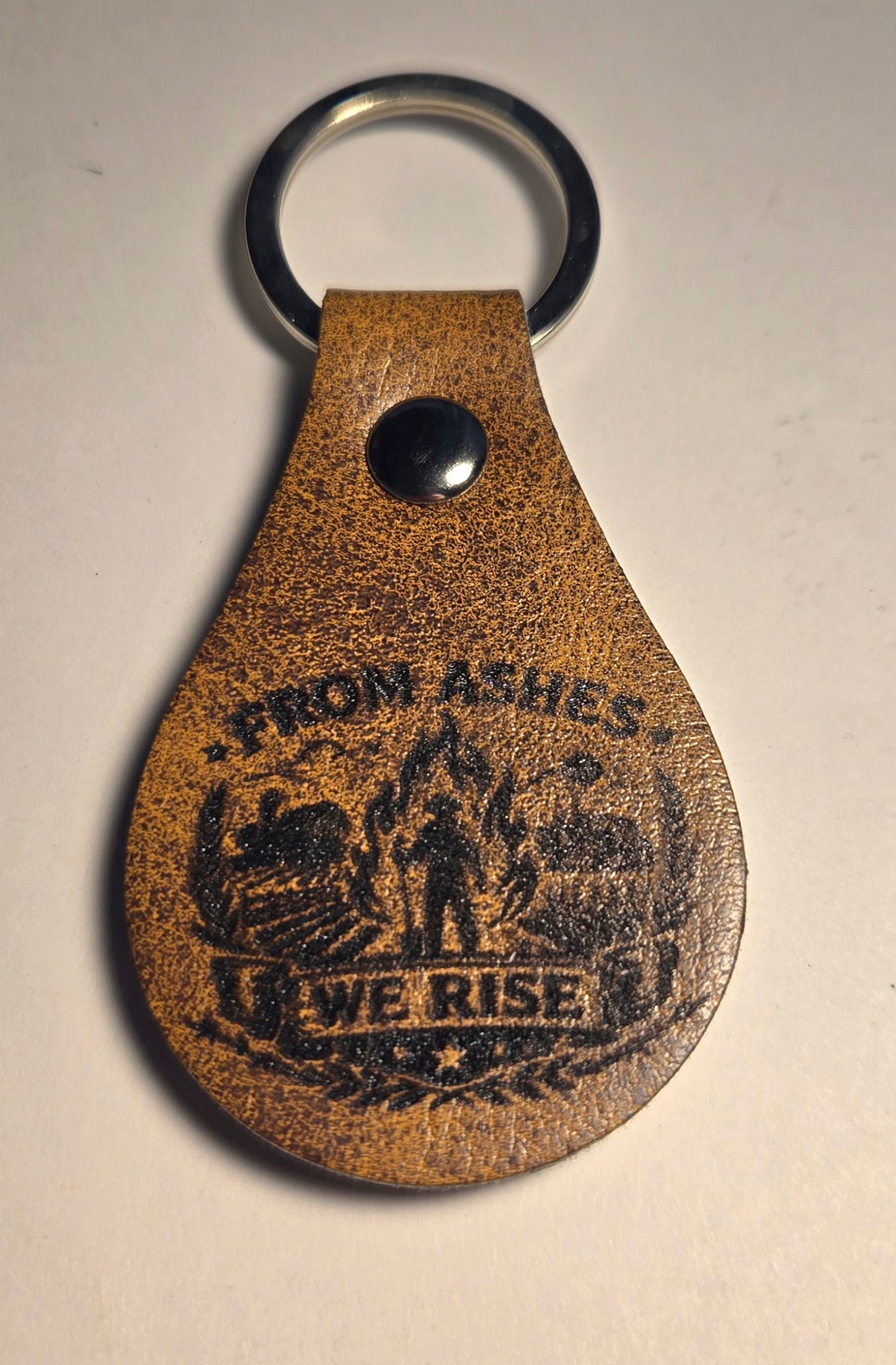 From The Ashes We Rise Keychains