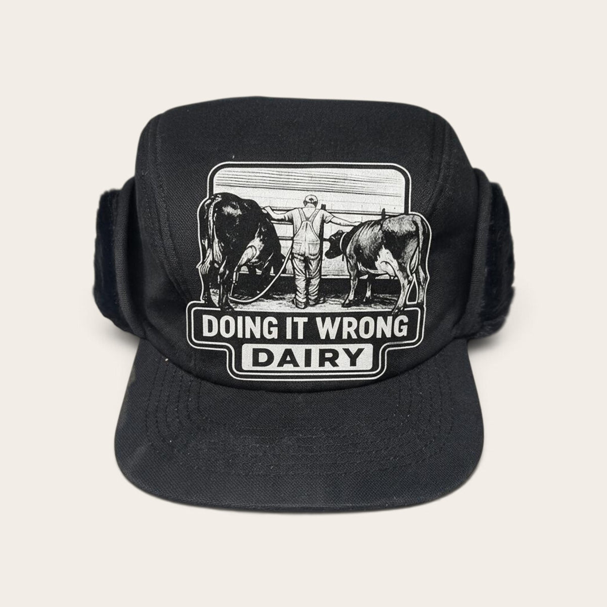 Ear Flapper Hat- Doing It Wrong Dairy Tie Stall