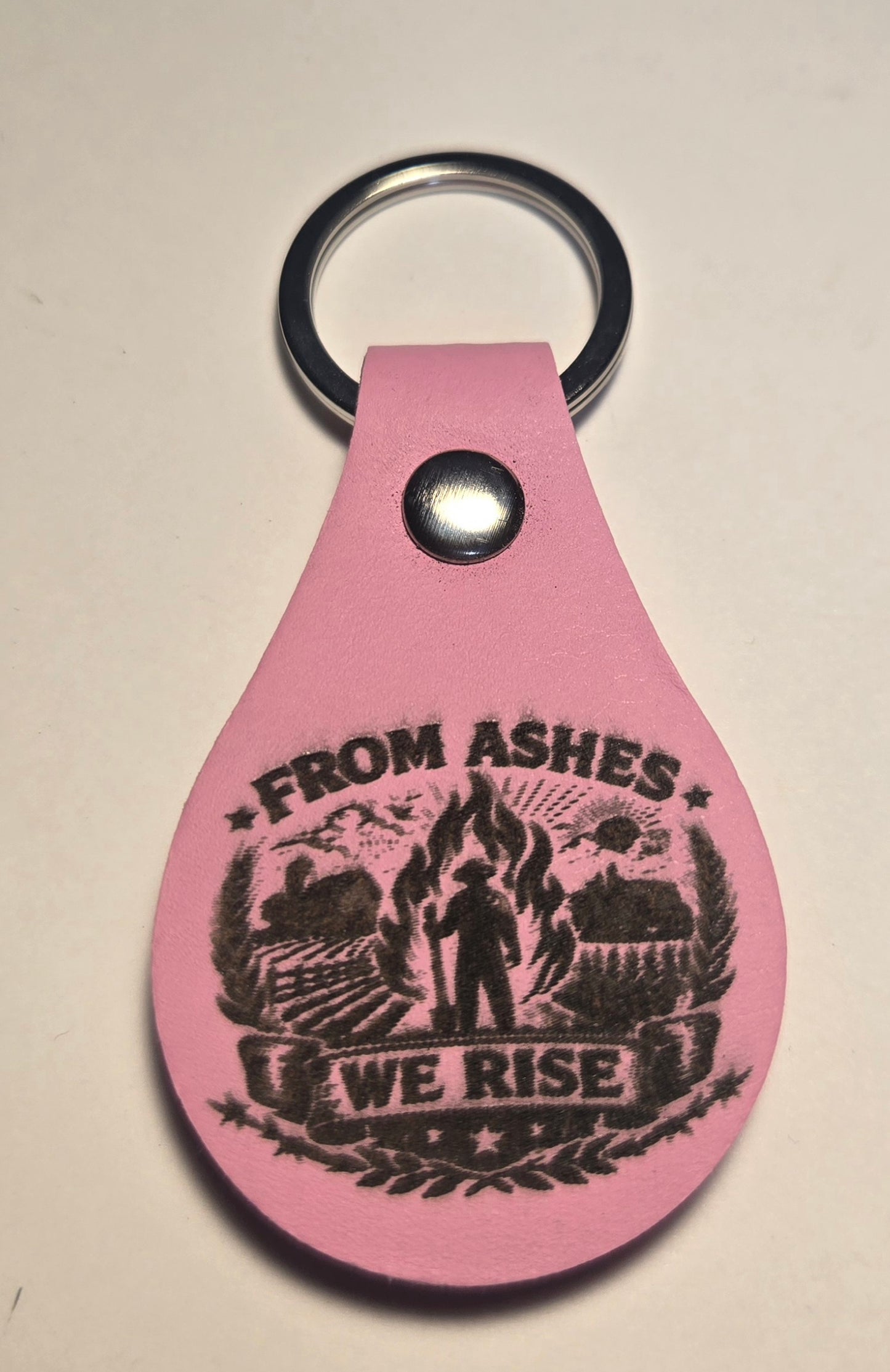From The Ashes We Rise Keychains